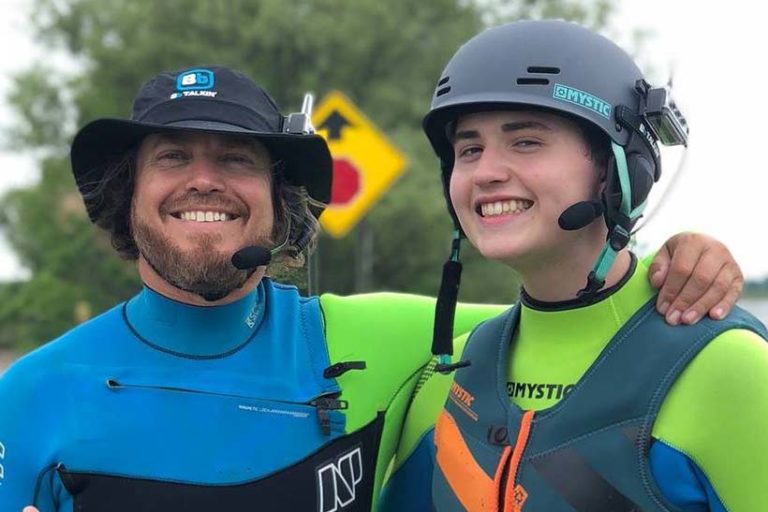 Stoked Kiteboarding instructor Scott with a smiling student