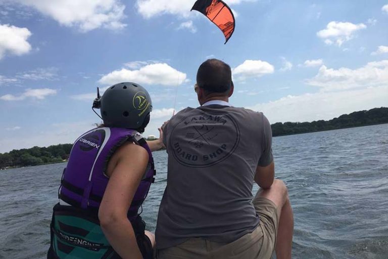 Student taking a kiteboard lesson